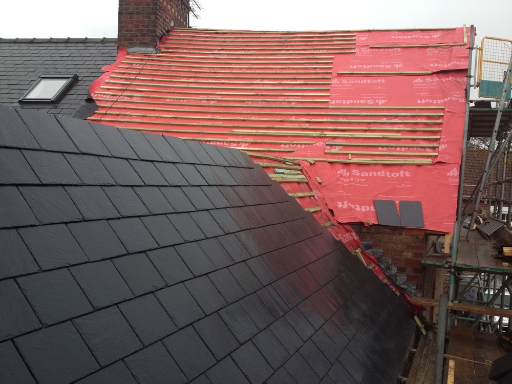 New slate roof in progress